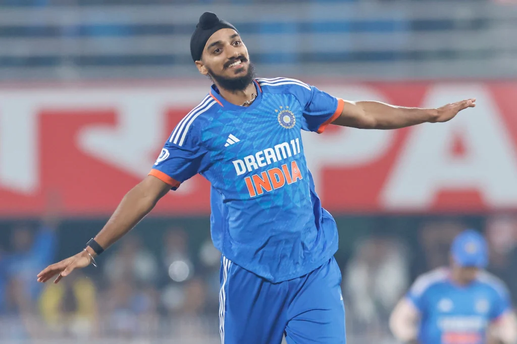 Arshdeep Singh celebrating a wicket during a T20 World Cup match after surpassing Jasprit Bumrah’s wicket tally for India.